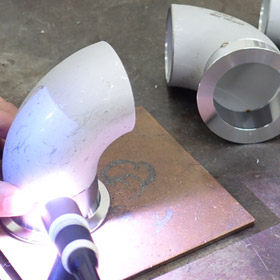 Welding on vacuum component to increase its accuracy, repeat-ability, and throughput