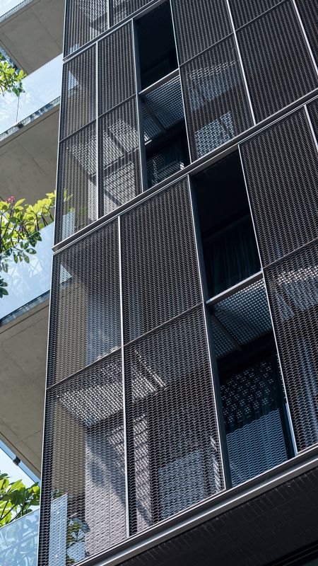 SKA 30-05 type Expanded metal mesh facades introduce natural light from multiple angles.