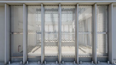 SKA 20-04 type Expanded metal mesh facades introduce natural light from multiple angles.