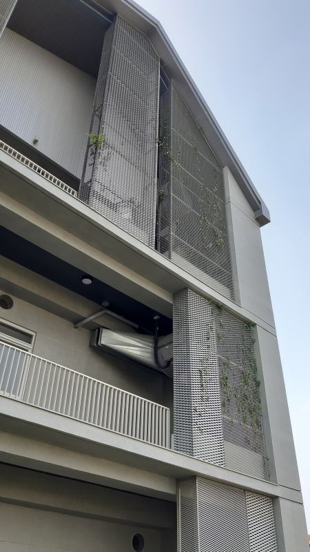 Different angles of SKA20-14 and SKA20-65 Expanded metal mesh facades introduce natural light from multiple angles.