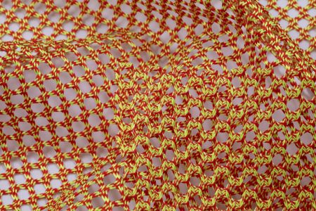 COPRIME이 적용된 투톤 오픈 메쉬 니트. 원단 번호 EFPOT014