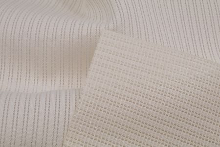 COPRIME이 적용된 스트라이프 패턴 메쉬 니트. 원단 번호 EFPPT003