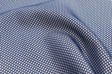 Recycled PET fabric for footwear use.