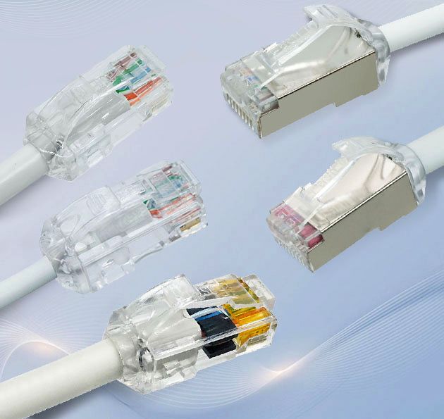 Multiple colored copper patch cords connect different devices