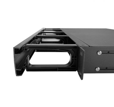 Front cover of the fiber cable management trough can be flipped up or down.