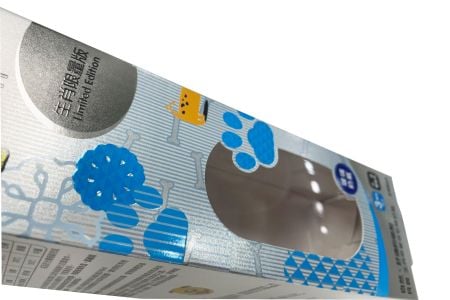 Silberne Folienverpackungsbox für Babyflaschen - Merkmale auf der Vorderseite