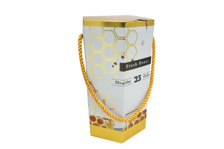 Emballage de boîte cadeau en miel avec design à porter à la main