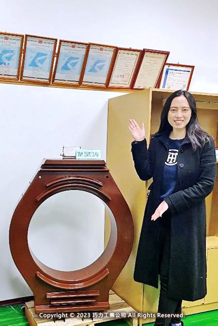 CIC Overseas Division’s Business Development Manager showing a supersized window current transformer by CIC.