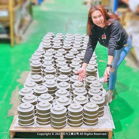 CIC representative showing a batch of newly made resin support insulators.