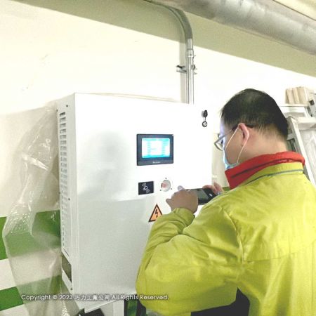 Customer learning how to use CIC’s 30 kW DC Charger for EV