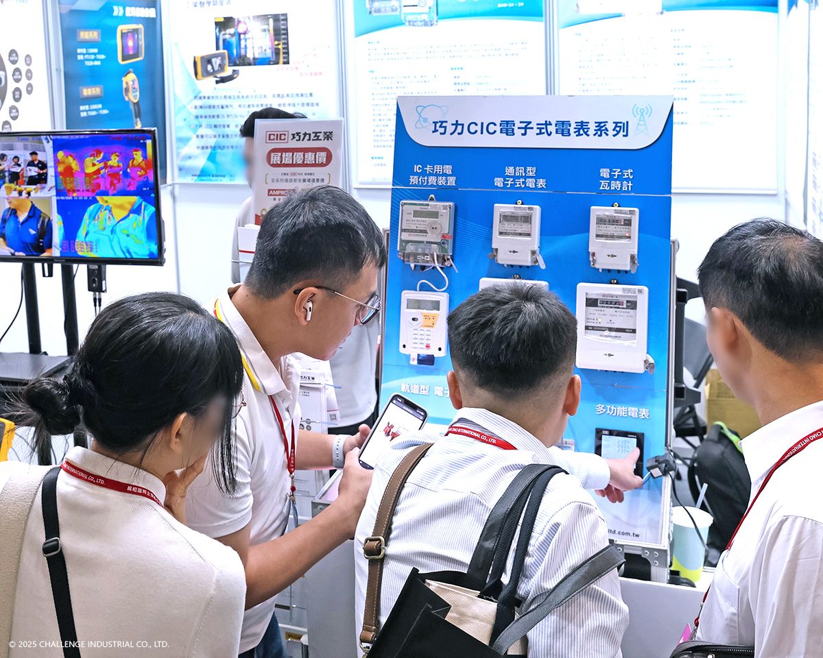 CIC team presenting electronic meters to visitors