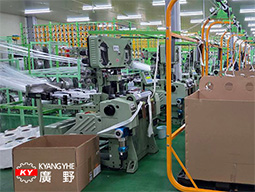A customer in South Korea uses the KDN SF electron frame needle loom to produce webbing for shock absorbing lanyards. The customer-provided photo documents this specialized application, showing KDN SF as part of the customer's webbing production equipment.