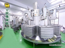 豆腐壓水機 - 大地興自動化豆腐壓水設備，適用於大規模食品生產線。