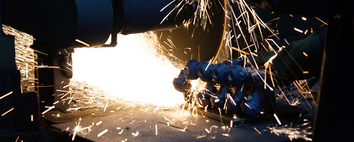 Handrail fitting component removal after lost wax casting is processed