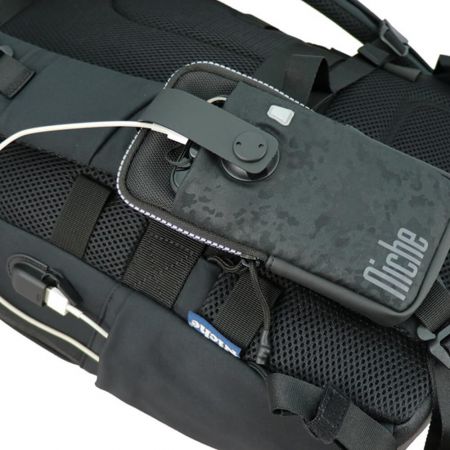 External USB charging port outside-connect with Patented FasRelis system mobile phone pouches.