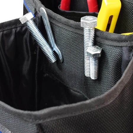 Magnetic pad on front pocket, holding small parts nail drill bits