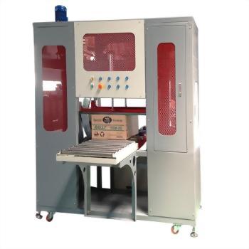 TC-5000 Carton Tape Wrapping Machine - The TC-5000 Carton Tape Wrapping Machine, shown from the front, designed for secure 360-degree tape sealing on cartons.